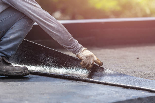 Professional Basement Waterproofing technician working in Burlington, OH